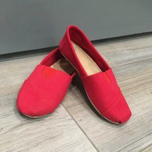 Red slip on canvas shoes